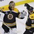 Bruins' Bergeron congratulates goalie Rask after his shutout win over the Blackhawks in Game 3 of their NHL Stanley Cup Finals hockey series in Boston
