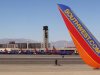FILE - In this file photo taken Feb. 28, 2011, Southwest Airlines planes are shown at McCarran International Airport in Las Vegas. Southwest said Thursday, Aug. 4, 2011, that it earned $161 million in the April-through-June quarter. That's up from $112 million a year ago. (AP Photo/Ted S. Warren, File)