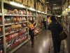Customers shop at a supermarket in Shanghai