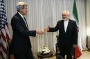 U.S. Secretary of State John Kerry, left, shakes hands with Iranian Foreign Minister Mohammad Javad Zarif before a meeting in Geneva, Switzerland Wednesday, Jan. 14, 2015. Zarif said on Wednesday that his meeting with Kerry was important to see if progress could be made in narrowing differences on his country's disputed nuclear program. (AP Photo/Rick Wilking, Pool)