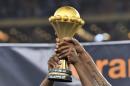 The 2013 Africa Cup of Nations trophy is displayed during celebrations after the final match on February 10, 2013 in Johannesburg