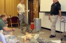 Handout photo shows Dr. Hagmann teaching a course in battlefield trauma