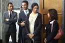 Karima el Mahroug, second from right, prepares to give her testimony in a court in Milan, Italy, Friday, May 24, 2013. The woman at the center of ex-Premier Silvio Berlusconi's sex scandal has denied in court ever telling a former roommate that she had sex with the then-premier. Karima el Mahroug appeared for a second day of testimony Friday at the trial of three former Berlusconi aides charged with procuring prosecutors for the media mogul's infamous "bunga bunga" parties. The trial is separate from the one charging Berlusconi with having paid for sex with a minor, el Mahroug herself, and then trying to cover it up. (AP Photo/Giuseppe Aresu)