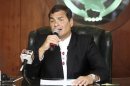 Ecuadorean President Rafael Correa addresses the media during a news conference in Quito