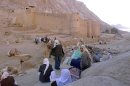 Egyptian Bedouins wait for tourists outside the walls of Saint Catherine monastery