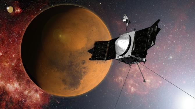 In this artist concept provided by NASA, the MAVEN spacecraft approaches Mars on a mission to study its upper atmosphere. When it arrives on Sunday Sept. 21, 2014, MAVEN&#39;s 442 million mile journey from Earth will culminate with a dramatic engine burn, pulling the spacecraft into an elliptical orbit. It&#39;s designed to circle the planet, not land. (AP Photo/NASA)