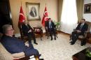 Turkey's Prime Minister Davutoglu meets opposition Nationalist Movement Party (MHP) Leader Bahceli as part of the coalition talks in Ankara, Turkey