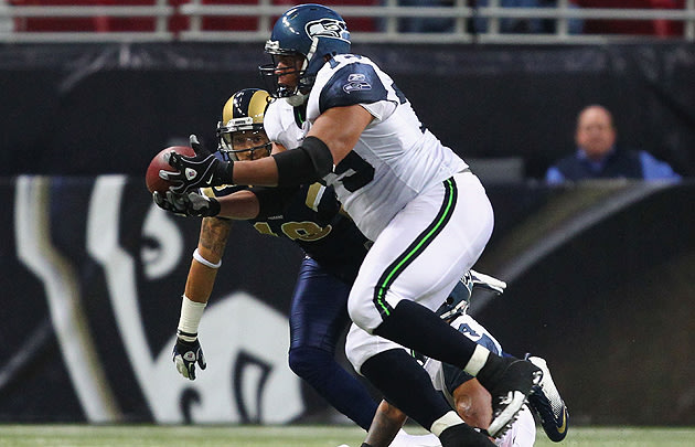 SEATTLE SEAHAWKS agree to multi-year deal with big DE Red Bryant; re-sign Farwell