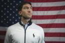 FILE - In this Sept. 30, 2013, file photo, Olympic figure skating champion Evan Lysacek poses for a portrait at the 2013 Team USA Media Summit, in Park City, Utah. Lysacek,the reigning Olympic figure skating champion, announced Tuesday, Dec. 10, 2013 that a torn labrum in his left hip will keep him from competing in the winter Olympics in Sochi. (AP Photo/Carlo Allegri, File)