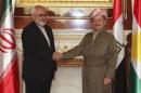 Iraqi Kurdish regional President Barzani shakes hands with Iranian foreign minister Zarif in Arbil
