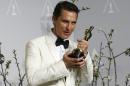 Matthew McConaughey holds his Oscar for Best Actor for the film "Dallas Buyers Club" at the 86th Academy Awards in Hollywood