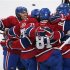 Montreal Canadiens Eller celebrates his goal over the New York Rangers with teammates during second period NHL hockey action in Montreal