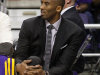 Los Angeles Lakers' Kobe Bryant watches from the bench during the second half of an NBA basketball game against the Phoneix Suns, Saturday, April 7, 2012, in Phoenix. (AP Photo/Matt York)