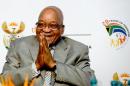 South Africa President Jacob Zuma gestures during the opening ceremony of the first national Broad-Based Black Economic Empowerment (B-BBEE) summit in Midrand on October 3, 2013