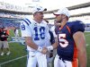FILE - In this Sept. 26, 2010 file photo, Indianapolis Colts quarterback Peyton Manning (18) greets Denver Broncos quarterback Tim Tebow (15) at an NFL game, in Denver. Manning is negotiating to join the Broncos, ESPN reported Monday, March 19, 2012.  Citing anonymous sources, ESPN said that the four-time MVP has instructed agent Tom Condon to negotiate the details of a deal with Denver.  (AP Photo/Greg Trott) MANDATORY CREDIT MAGS OUT TV OUT