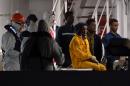 Rescued migrants arrive in Catania, Italy, on April 20, 2015