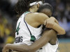 Notre Dame guard Skylar Diggins (4) and Notre Dame forward Devereaux Peters (14) embrace after overtime in the NCAA women's Final Four semifinal college basketball game against Connecticut, in Denver, Sunday, April 1, 2012. Notre Dame won 83-75. (AP Photo/Eric Gay)
