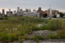 Downtown Detroit is seen from a vacant lot, looking south along Woodward Avenue
