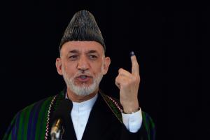 Afghan President Hamid Karzai holds up his inked finger&nbsp;&hellip;