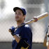 FILE - In this Feb. 25, 2012, file photo, Milwaukee Brewers' Ryan Braun waits for his turn to take batting practice during baseball spring training in Phoenix. People familiar with the case tell The Associated Press there may never be a written decision explaining why Braun's drug suspension was overturned. (AP Photo/Paul Connors, File)