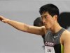 China's Liu Xiang gestures to the crowd before competing at 110m hurdles event at the 2012 Samsung Diamond League competition in Shangha