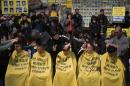 Relatives of victims of the Sewol ferry accident have their heads shaved during a protest ahead of the anniversary of the disaster in Seoul on April 2, 2015
