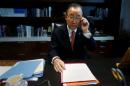 United Nations Secretary General Ban Ki-moon sits at his desk as he poses for a portrait in his office at United Nations Headquarters in the Manhattan borough of New York