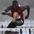 Hansle Parchment runs during the men's 110 meters hurdles semi finals at the Jamaican Olympic trials in Kingston city