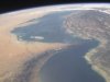This image provided by NASA shows the Strait of Hormuz taken from the International Space Station in Sept. 30, 2003. An Iranian newspaper quotes a senior commander in Iran's Revolutionary Guard Sunday Jan. 8, 2012 as saying that Tehran's leadership has decided to order the closure of the strategic Strait of Hormuz at the mouth of the Persian Gulf if the country's oil exports are blocked. (AP Photo/NASA)