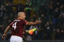 AS Roma's US midfielder Michael Bradley celebrates after scoring at "Stadio Friuli" in Udine on October 27, 2013