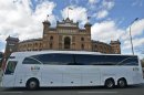 The bus carrying members of the IOC passes in front of the Las Ventas bullring in Madrid