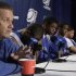 Kentucky head coach John Calipari, left, speaks during a news conference, Saturday, March 24, 2012, in Atlanta. Kentucky is scheduled to play Baylor in the NCAA college basketball tournament South Regional finals on Sunday, March 25. (AP Photo/David J. Phillip)