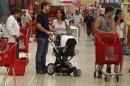 People make their shopping at a supermarket in Lisbon