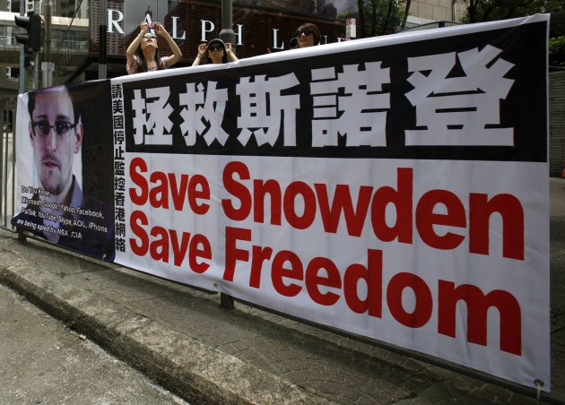 Guardian: Snowden won't return voluntarily to US - Yahoo! News