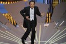 Billy Crystal performs during the 84th Academy Awards on Sunday, Feb. 26, 2012, in the Hollywood section of Los Angeles. (AP Photo/Mark J. Terrill)