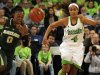 Baylor guard Odyssey Sims, left and Notre Dame guard Skylar Diggins give chase for a loose ball during the first half of an NCAA college basketball game on Wednesday, Dec. 5, 2012, in South Bend, Ind.  (AP Photo/Joe Raymond