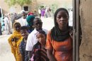 People queue to vote during Mali's presidential election in Timbuktu