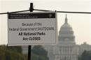 A sign on the National Mall tells visitors of the closures do to the federal government shutdown in Washington