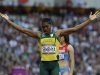 South Africa's Caster Semenya raises her arms following her women's 800-meter semifinal during the athletics in the Olympic Stadium at the 2012 Summer Olympics, London, Thursday, Aug. 9, 2012. (AP Photo/Lee Jin-man)