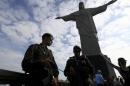 spoBrazilian security forces stand guard under the Christ the Redeemer statue in Rio de Janeiro