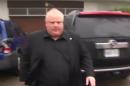 Toronto Mayor Rob Ford leaves his home in Toronto in this still image taken from video