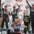 Driver Jeff Gordon, center, celebrates in victory lane after winning the NASCAR Sprint Cup AdvoCare 500 auto race, Tuesday, Sept. 6, 2011, at the Atlanta Motor Speedway, in Hampton, Ga. (AP Photo/Erik S Lesser)