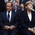 France's President Hollande and Germany's Chancellor Merkel sit together before 50th anniversary ceremony of reconciliation speech of France's President Charles de Gaulle to Germany youth after World War II, in Ludwigsburg