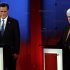 Republican presidential candidates, former Massachusetts Gov. Mitt Romney, left, stands next to former House Speaker Newt Gingrich before a Republican Presidential debate Monday Jan. 23, 2012, at the University of South Florida in Tampa, Fla. (AP Photo/Paul Sancya)