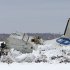 Russian Emergency Ministry rescuers search the site of the ATR-72 plane crash outside Tyumen, a major regional center in Siberia, Russia, Monday, April 2, 2012. A passenger plane crashed in Siberia shortly after taking off on Monday morning, killing 32 of the 43 people on board, Russian emergency officials said. The 11 survivors were hospitalized in serious condition. The ATR-72, a French-Italian-made twin-engine turboprop, operated by UTair was flying from Tyumen to the oil town of Surgut with 39 passengers and four crew. (AP Photo/Marat Gubaydullin)