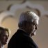 Republican presidential candidate former House Speaker Newt Gingrich accompanied by his wife Callista speaks during an event at a Holiday Inn, Wednesday, Jan. 25, 2012, in Cocoa, Fla. (AP Photo/Matt Rourke)