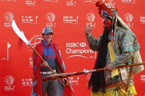 Golfer Rory McIlroy of Northern Ireland attends a photo call for the WGC-HSBC Champions golf tournament on the Bund in Shanghai