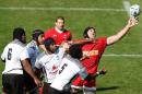 Canada's lock Jamie Cudmore (R) reaches for the ball during their international Rugby Union friendly match against Fiji in Twickenham, England, on September 6, 2015