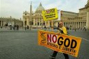 A DEMONSTRATOR HOLDS UP A BANNER POSTER DURING A PROTEST OUTSIDE THE VATICAN.