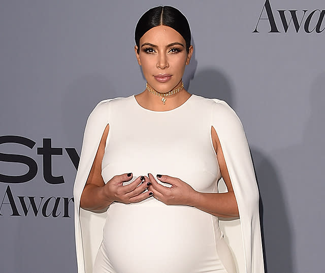 Kim Kardashian’s New Year’s Resolutions Include Shedding the Baby Weight, Learning to Do the Splits
